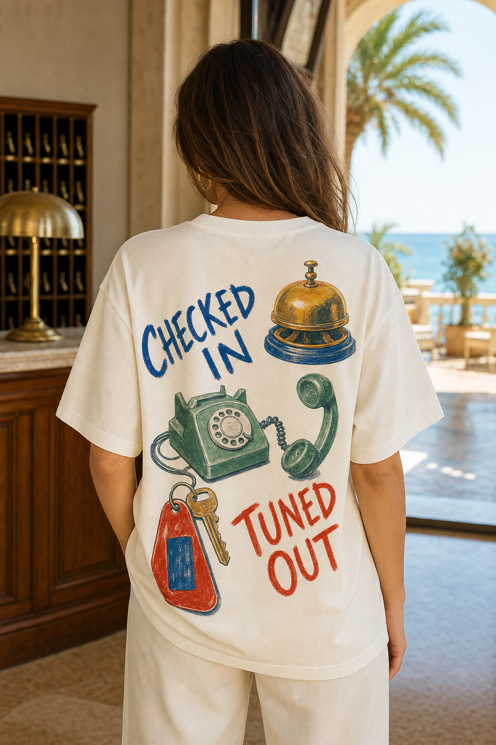 CHECKED IN, TUNED OUT oversized t-shirt - back view